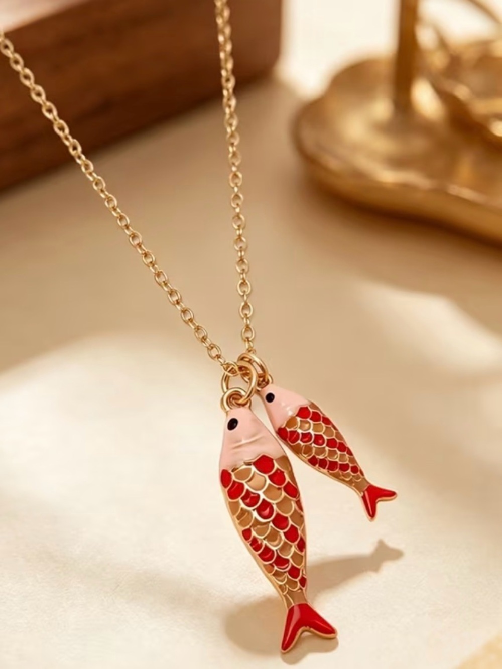 Gold-Tone Double Fish Pendant Necklace in Red and Pink